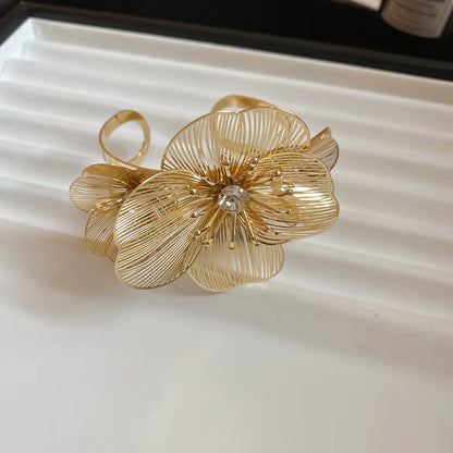 Gilded Bloom Statement Drop Earrings